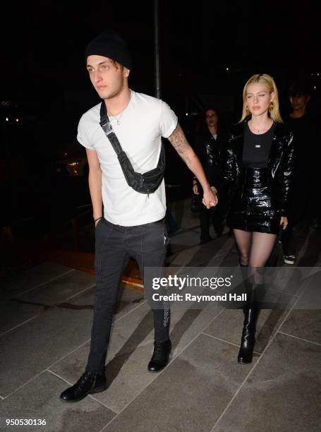 Model Anwar Hadid and Nicola Peltz are seen arriving at Gigi Hadid's party in Brooklyn on April 23, 2018 in New York City.