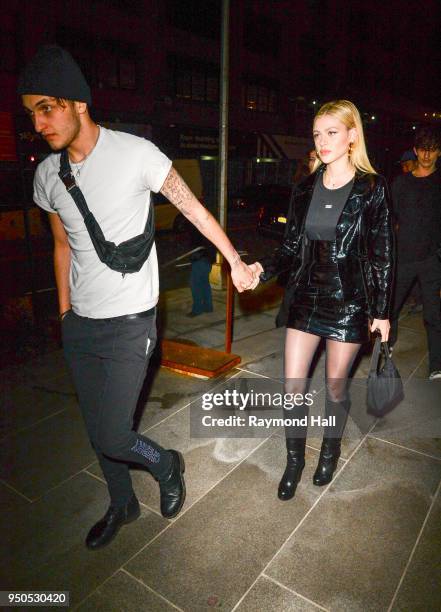 Model Anwar Hadid and Nicola Peltz are seen arriving at Gigi Hadid's party in Brooklyn on April 23, 2018 in New York City.