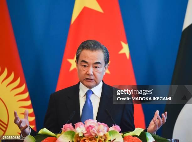 Chinese Minister Wang Yi attends a press conference after a meeting with foreign ministers and officials of the Shanghai Cooperation Organisation at...