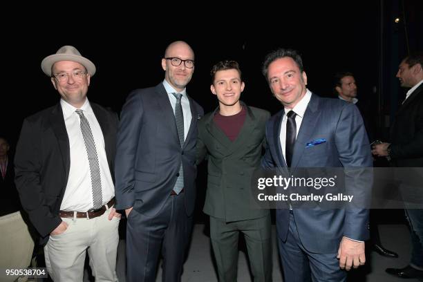 Writer Christopher Markus, writer Stephen McFeely, actor Tom Holland, and Marvel Studios Co-President Louis D'Esposito attend the Los Angeles Global...