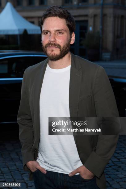 Actor Daniel Bruehl attends the '7 Tage in Entebbe' Premiere at Kino in der Kulturbrauerei on April 23, 2018 in Berlin, Germany.