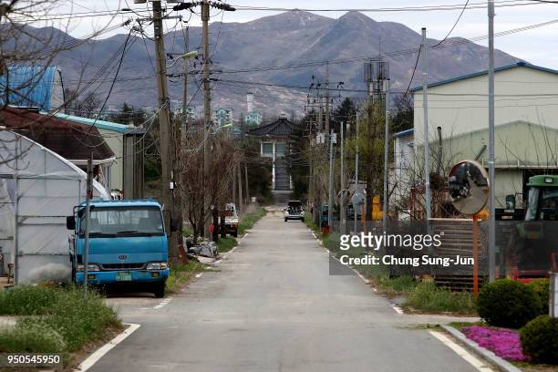 North Korea's propaganda village of Gijungdong is seen from South Korea's Taesungdong freedom village on April 24, 2018 in Paju, South Korea....