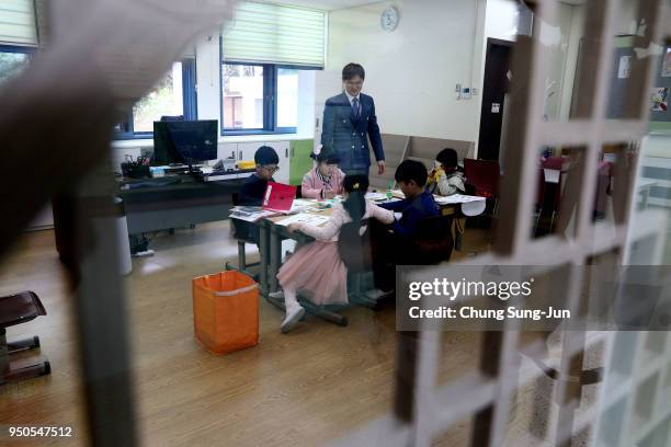 South Korean children take a class at the Taesungdong elementary school on April 24, 2018 in Paju, South Korea. Taesungdong is the only civilian...