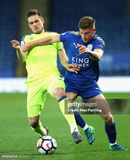 Harvey Barnes of Leicester City holds off Timi Max Elsnik of Derby County during the Premier league 2 match between Leicester City and Derby County...