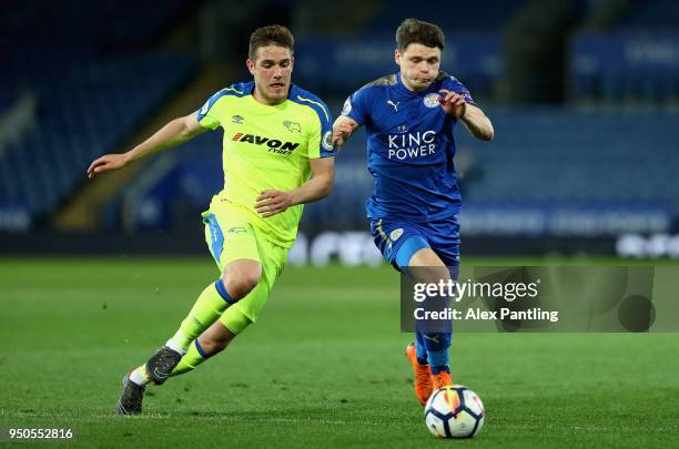 Connor Wood of Leicester City clashes with Timi Max Elsnik of Derby County during the Premier league 2 match between Leicester City and Derby County...