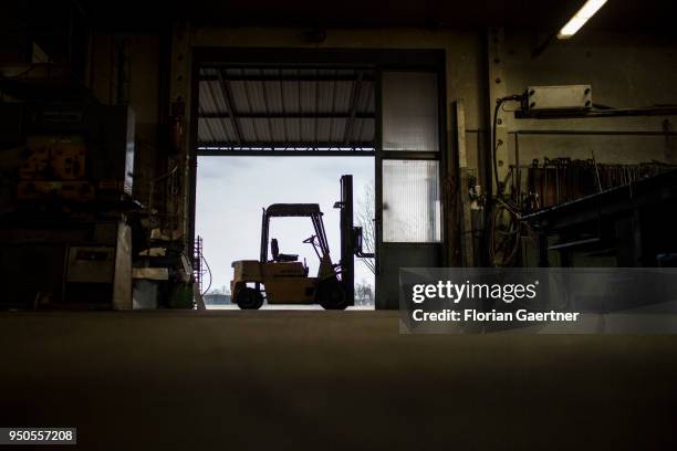 Forklift stands at the entrance of a blacksmith shop on April 03, 2018 in Klitten, Germany.