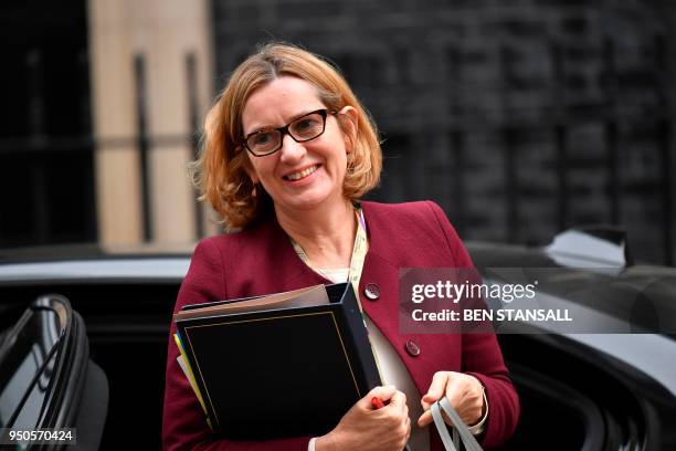 Britain's Home Secretary Amber Rudd arrives to attend the weekly meeting of the cabinet at Downing Street in central London on April 24, 2018.