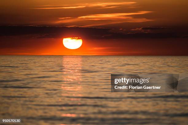 The sun sets on April 21, 2018 in Warnemuende, Germany.