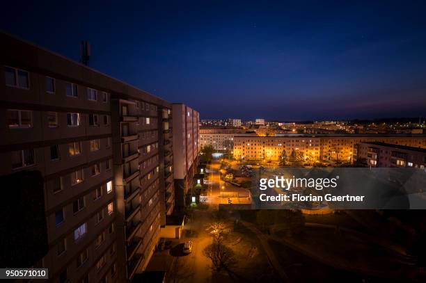 Blocks of flats are pictured at dusk on April 20, 2018 in Stendal, Germany.