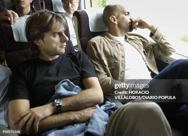 Claudio Lopez and Juan Sebastian Veron from Argentina's national soccer team travel by train from Hirono to Tokyo, Japan, 13 June 2002 the day after...