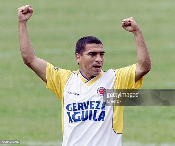 Colombia's Victor Ariztizabal celebrates his team's victory during a practice session in Armenia, Colombia, 28 July 2001. Colombia is scheduled to...