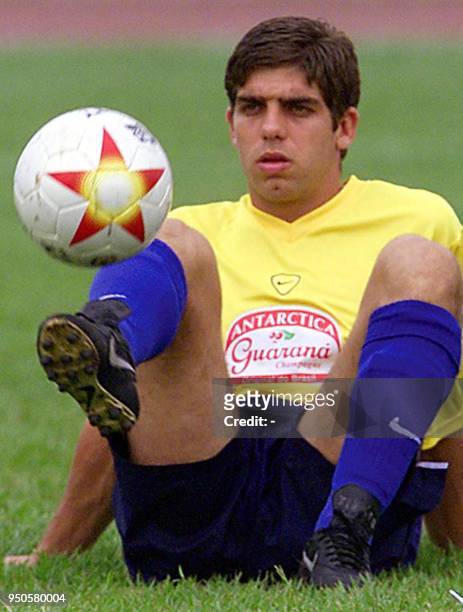 Brazilian soccer player, Juninho Pernambucano, plays with a soccer ball, 13 July 2001, during a practice in Cali, Colombia. Juninho will replace...