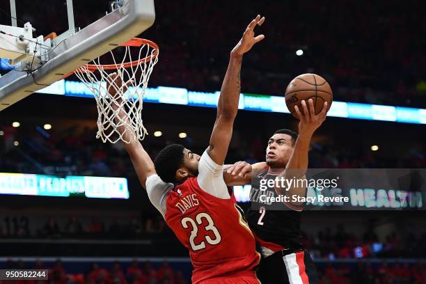 Wade Baldwin IV of the Portland Trail Blazers is defended by Anthony Davis of the New Orleans Pelicans during Game Four of the first round of the...
