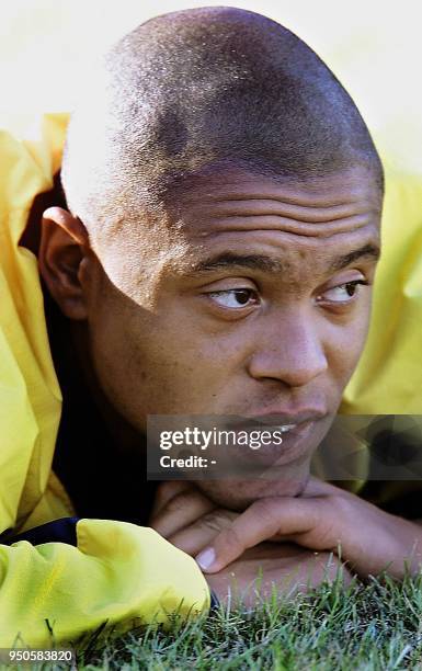 Brazilian Under-20 soccer player, Batista, watches his teammates, 22 June 2001, during a training session in Cordoba, Argentina. El jugador brasileno...