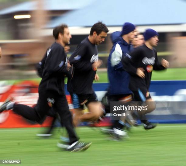 Alvaro Recoba , player of the Uruguayan soccer team, runs with his teammates, 19 June 2001, during a training session, 19 June 2001 in Montevideo, in...