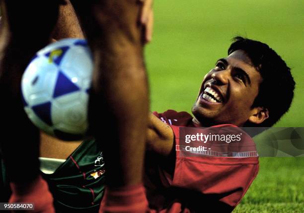 Mexican player Pavel Pardo , jokes with one of his teammates during practice, 19 June 2001, at the San Pedro Sula Olympic Stadium, Honduras. El...