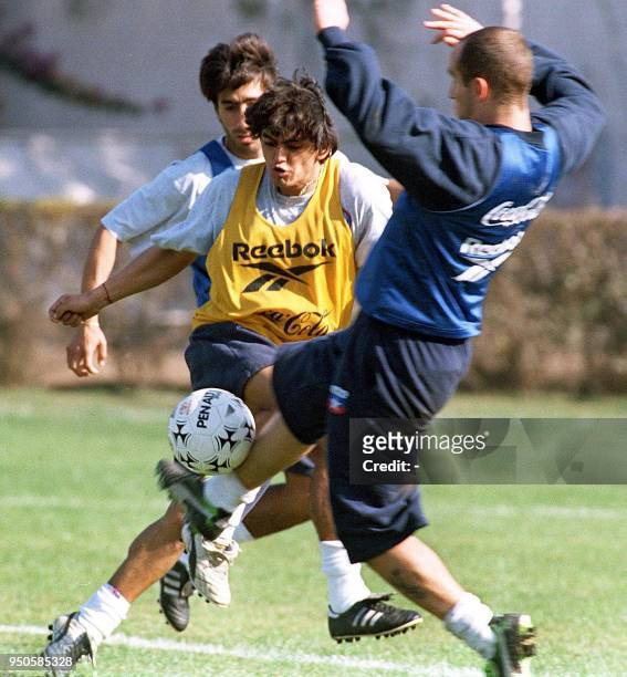 Chilean soccer players Clarence Acuna, Francisco Rojas, and Javier Margas train in Santiago, Chile 18 June 1999. Los seleccionados chilenos Clarence...