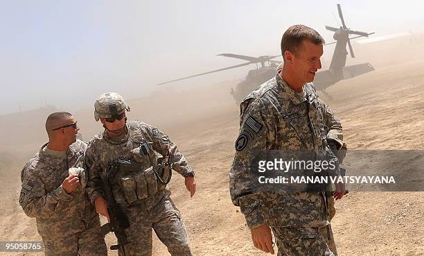Commander of the NATO-led International Security Assistance Force US General Stanley McChrystal arrives at the Baraki Barak Joint combat Outpost in...