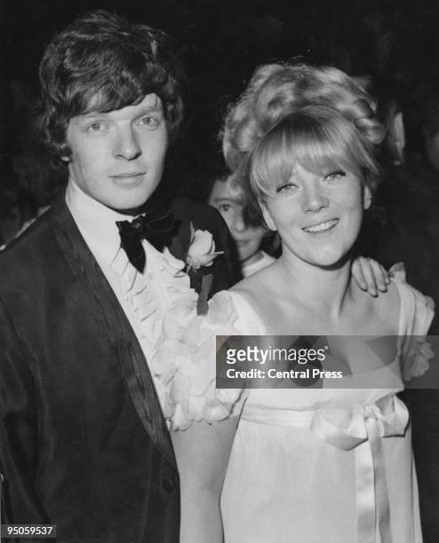 English actress Julia Foster with her husband, singer Lionel Morton, at the premiere of the Beatles' film 'Yellow Submarine', directed by George...