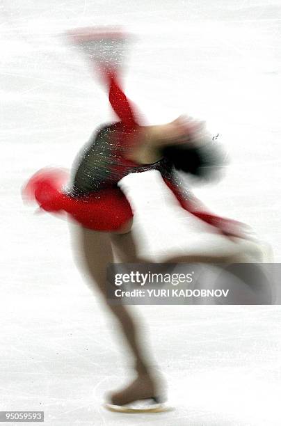 Russian Irina Slutskaya performs in the free program of the Cup of Russia ISU Grand Prix figure skating event in St. Petersburg 26 November 2005. AFP...