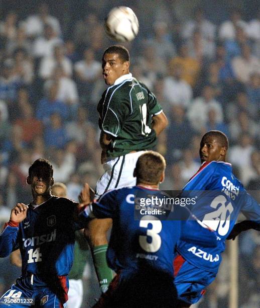 Lopes of the team Palmeiras fights for the ball with Serginho da Silva , Daniel and Fabinho of Sao Caetano during a match of the Copa Libertadores de...