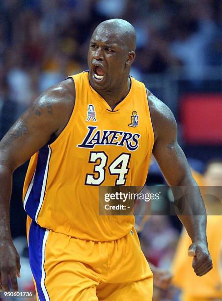 This 07 June 2002 file photo shows Shaquille O'Neal of the Los Angeles Lakers yelling after a score against the New Jersey Nets in the 3rd quarter of...