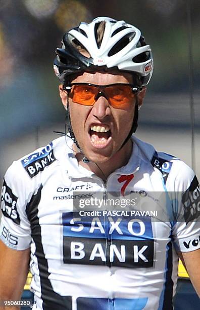 Danish cycling team Team Saxo Bank 's Nicki Sorensen of Denmark jubilates on the finish line on July 16, 2009 in the 200 km and twelfth stage of the...