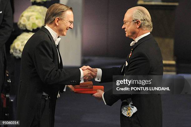 Researcher Jack W. Szostak receives the Nobel Prize in Medicine from King Carl XVI Gustaf of Sweden during the Nobel prize award ceremony at the...