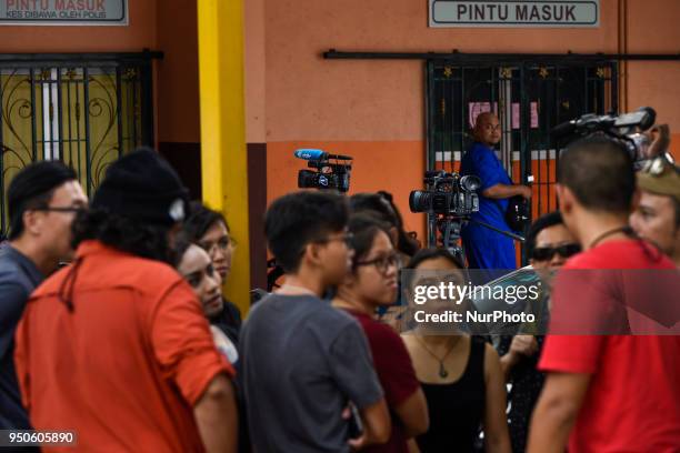 Press are stand by at outside of the forensics of the Selayang Hospital in Kuala Lumpur on April 24, 2018. A Palestinian scholar and a lecture of...