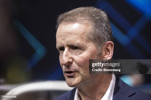 Herbert Diess, chief executive officer of Volkswagen AG , speaks at a media event ahead of the Beijing International Automotive Exhibition, in...