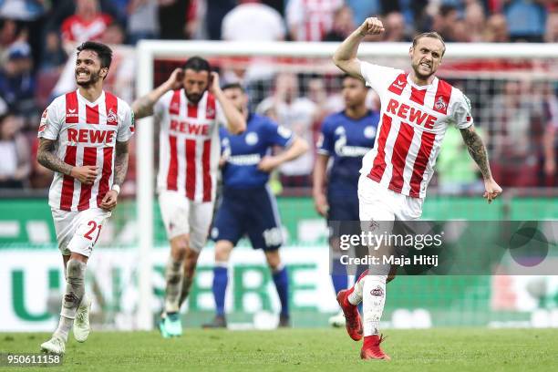 Marcel Risse of Koeln celebrates after he scores the 2nd goal during the Bundesliga match between 1. FC Koeln and FC Schalke 04 at...