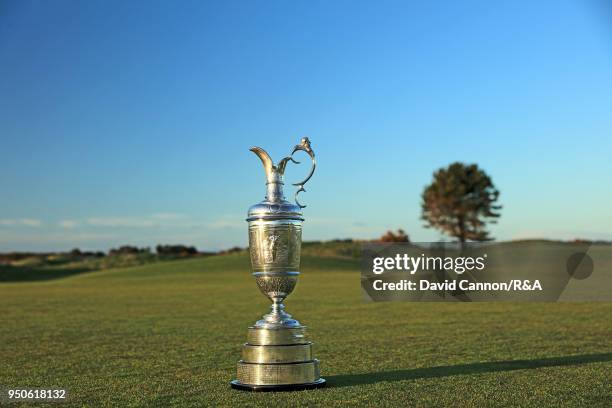 The Claret Jug the Open Championship trophy on the fifth green during the media day for the 147th Open Championship on the Championship Course at the...