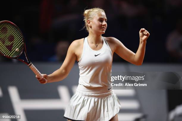 Marta Kostyuk of Ukraine celebrates after winning her match against Antonio Lottner of Germany during day 2 of the Porsche Tennis Grand Prix at...