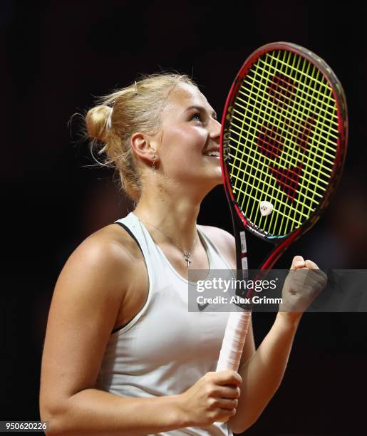 Marta Kostyuk of Ukraine celebrates after winning her match against Antonio Lottner of Germany during day 2 of the Porsche Tennis Grand Prix at...