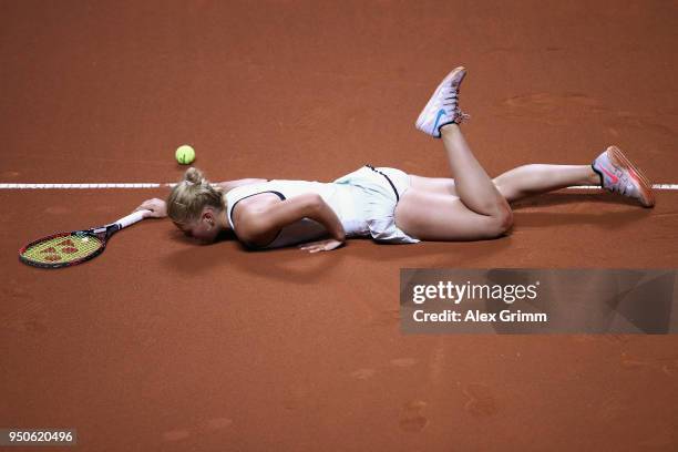 Marta Kostyuk of Ukraine reacts during her match against Antonio Lottner of Germany on day 2 of the Porsche Tennis Grand Prix at Porsche-Arena on...