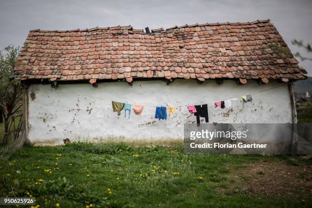 House of a roma settlement is pictured on April 17, 2018 in Porumbenii Mari, Romania.