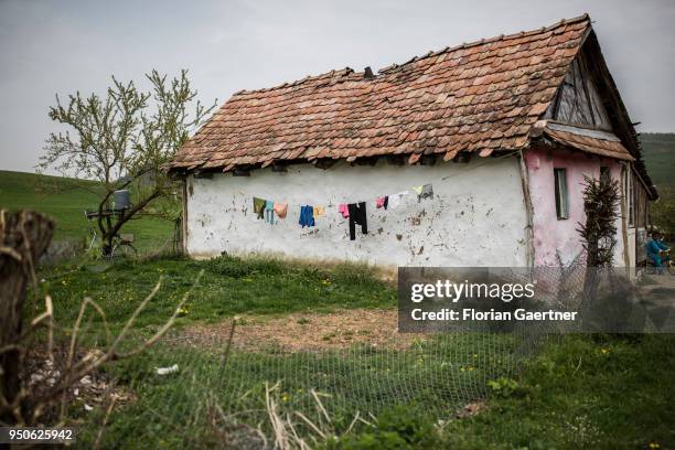 House of a roma settlement is pictured on April 17, 2018 in Porumbenii Mari, Romania.