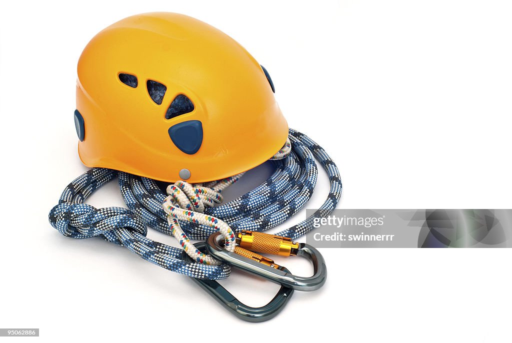 Climbing equipment - carabiners, helmet and blue rope