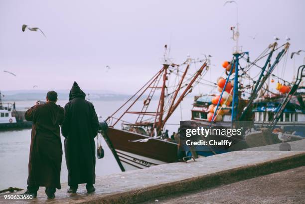 fishermen - djellaba stock pictures, royalty-free photos & images