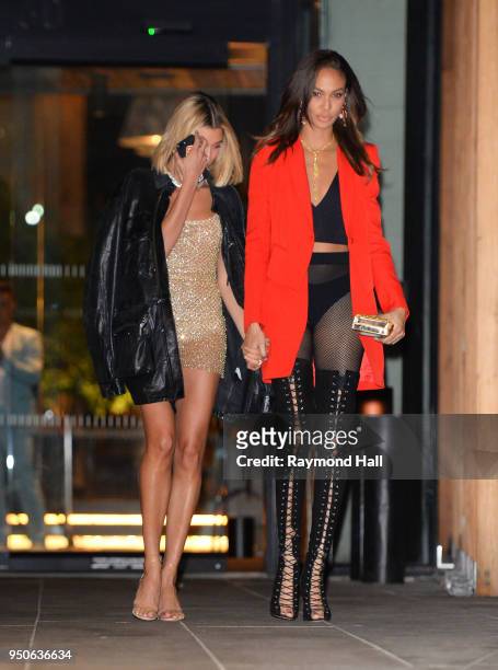 Model Hailey Baldwin, Joans Smalls are seen leaving Gigi Hadid's party in Brooklyn on April 23, 2018 in New York City.