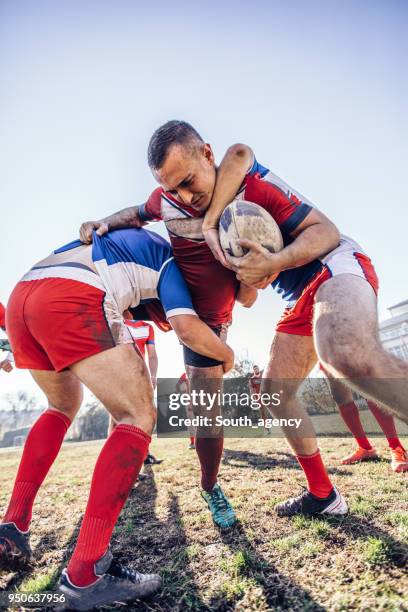 hard rugby game - work hard play hard stock pictures, royalty-free photos & images