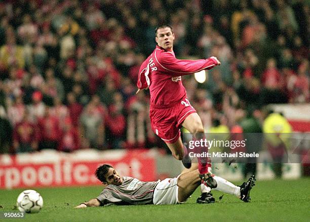 Jamie Carragher of Liverpool moves past Christos Patsatzoglou of Olympiakos during the UEFA Cup third round second leg match played at Anfield, in...