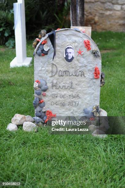 The gravestone of artist Damien Hirst from the art installation Eternity is displayed after the ceremony where Italian artist Maurizio Cattelan is...