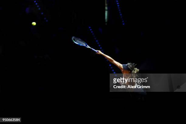 Maria Sharapova of Russia serves the ball to Caroline Garcia of France during day 2 of the Porsche Tennis Grand Prix at Porsche-Arena on April 24,...