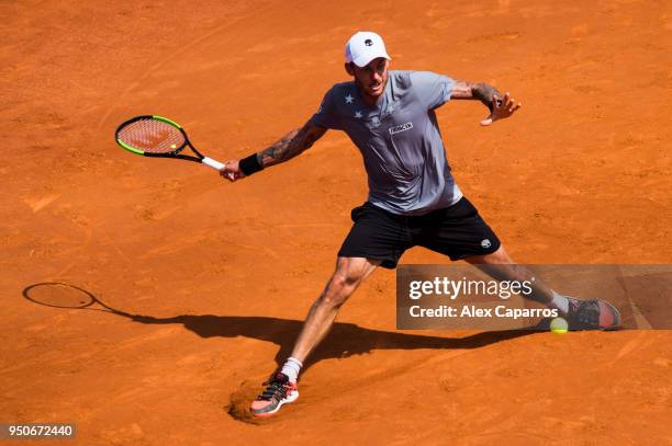 Andreas Haider-Maurer of Austria plays a forehand against Roberto Carballes Baena of Spain in their match during day three of the Barcelona Open Banc...
