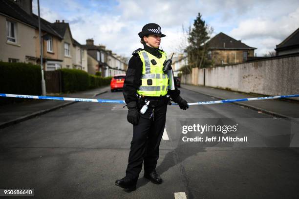 Police attend a house in Drumoyne where they are investigating the death of 47-year-old Julie Reilly on April 24, 2018 in Glasgow, Scotland....