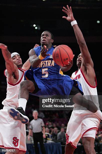 Chaz Williams of Hofstra Pride goes up for a shot against St. John's Red Storm at Madison Square Garden on December 20, 2009 in New York, New York.