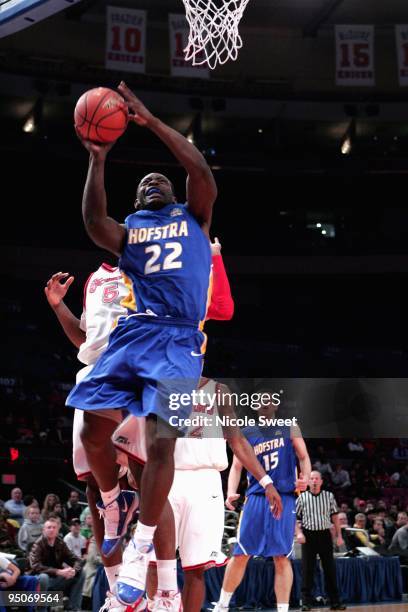 Charles Jenkins of Hofstra Pride goes up for a shot against St. John's Red Storm at Madison Square Garden on December 20, 2009 in New York, New York.