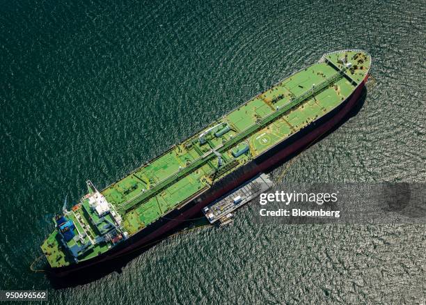 The Alaskan Frontier oil tanker takes on fuel at an outside anchorage in this aerial photograph taken near the Port of Los Angeles in Los Angeles,...