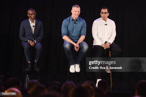 Spotifys Gustav Soderstrom, Troy Carter and Babar Zafar answer questions during Spotifys unveiling of its new ad-supported mobile version at a news...